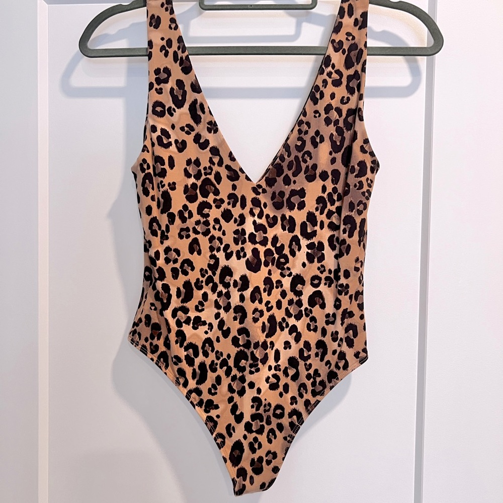 Not For Sale - Aritzia Babaton leopard body suit. Worn twice. Size Medium